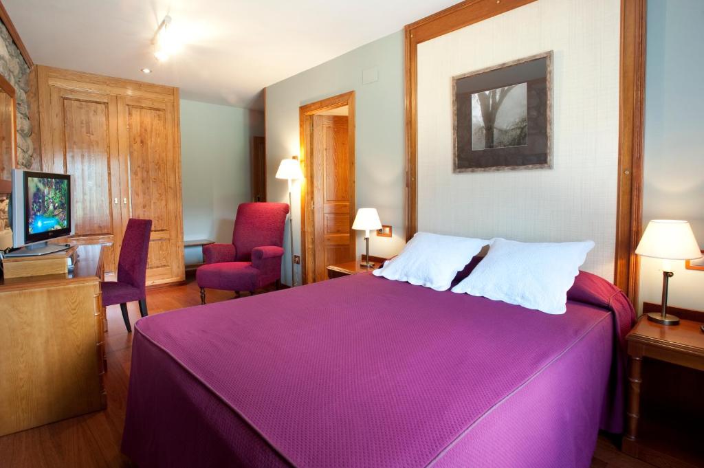 TV a/nebo společenská místnost v ubytování Hotel Diamó