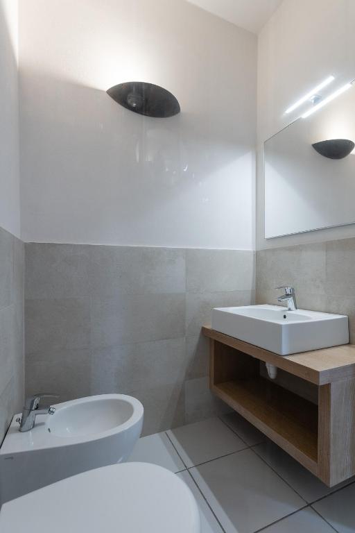 Koupelna v ubytování Hotel Delfino