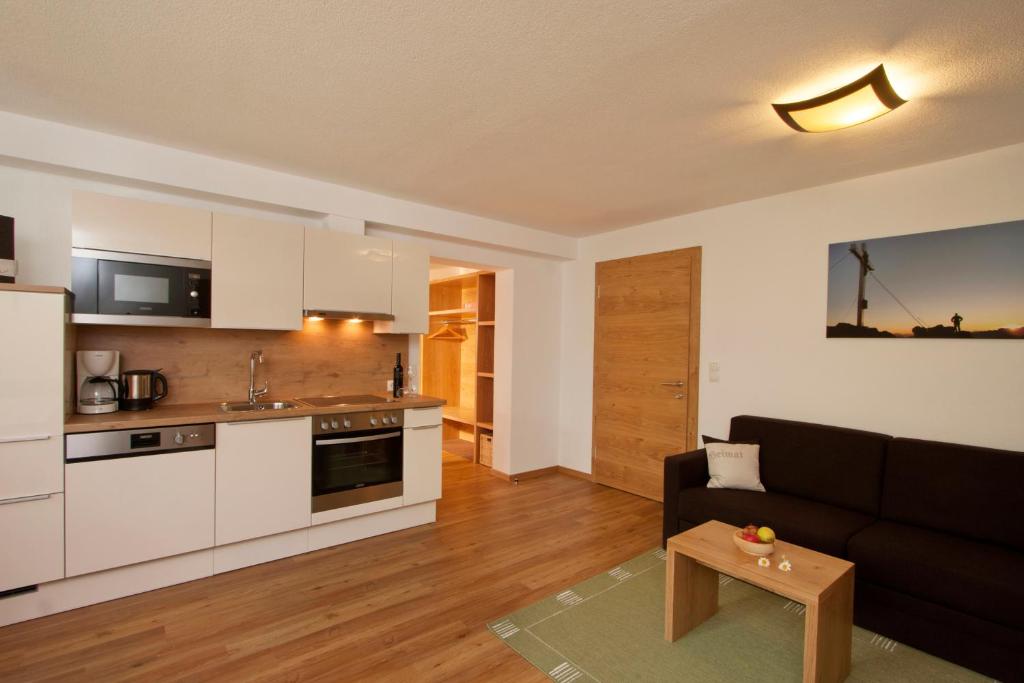 Kuchyň nebo kuchyňský kout v ubytování Apartmenthaus Juen