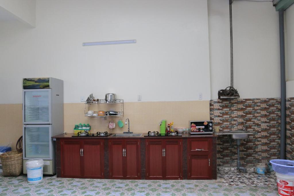 Kuchyň nebo kuchyňský kout v ubytování Xoài Xanh Hostel & Villa