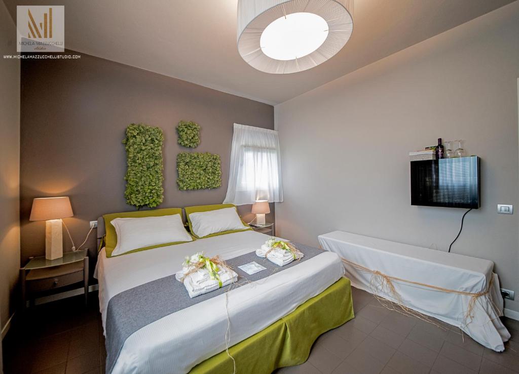 Postel nebo postele na pokoji v ubytování Art B&B Design