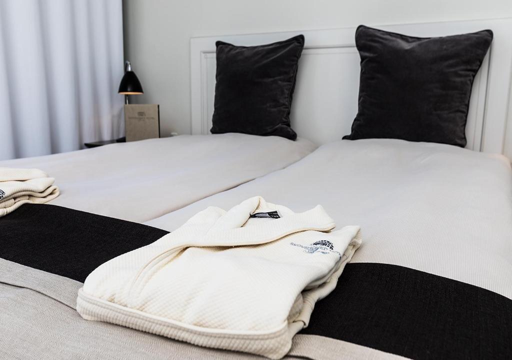 Postel nebo postele na pokoji v ubytování Skovshoved Hotel