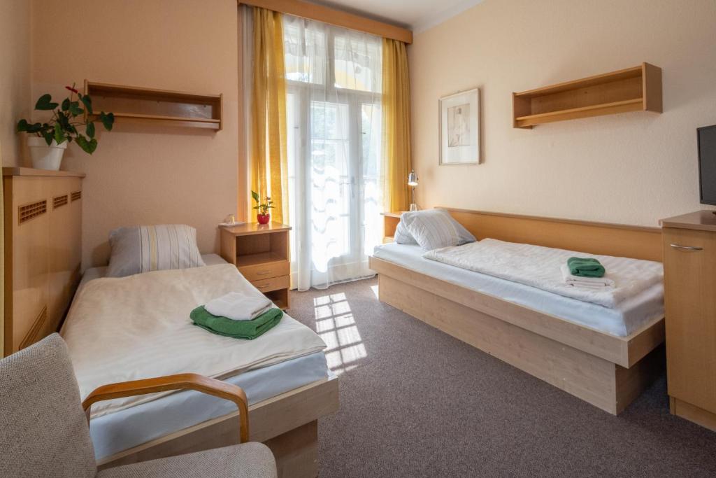 Ένα ή περισσότερα κρεβάτια σε δωμάτιο στο Bellevue