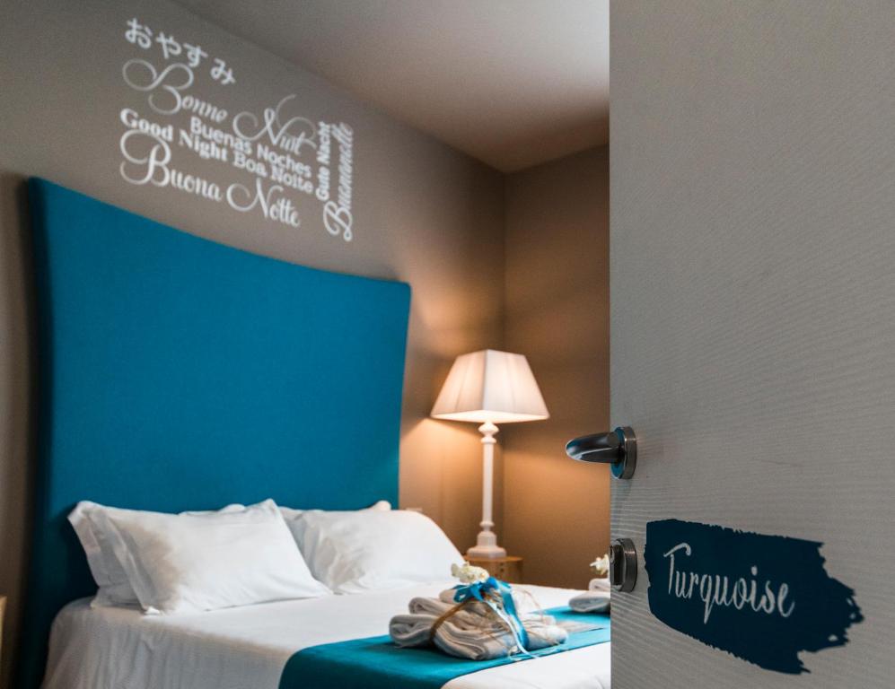 Postel nebo postele na pokoji v ubytování Art B&B Design
