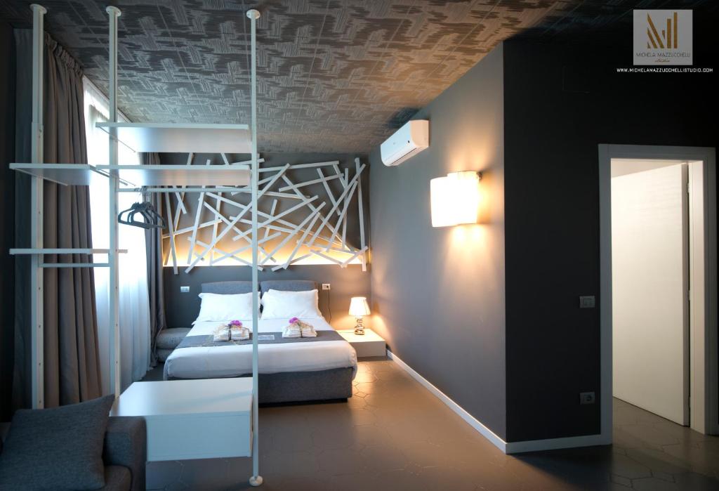 Postel nebo postele na pokoji v ubytování Art B&B Design