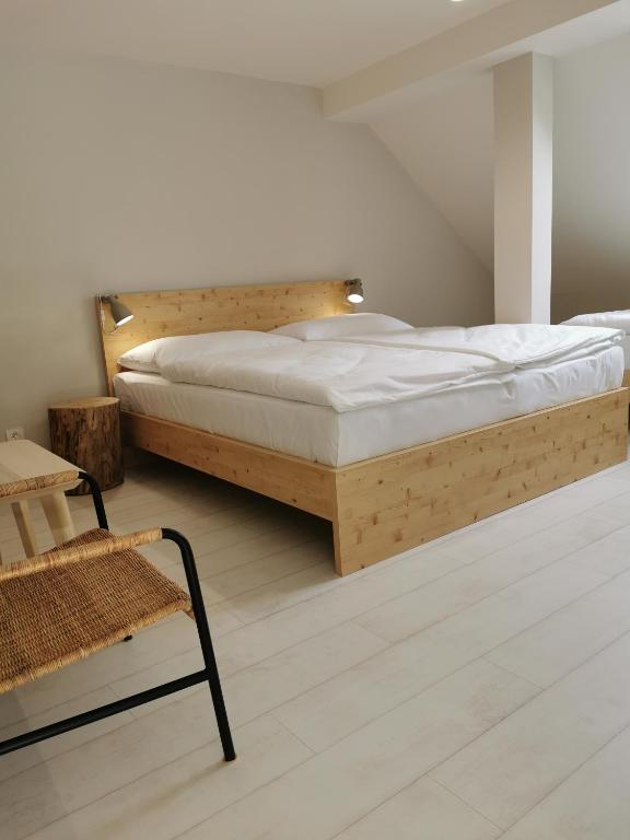 Postel nebo postele na pokoji v ubytování Apartmány Slunce