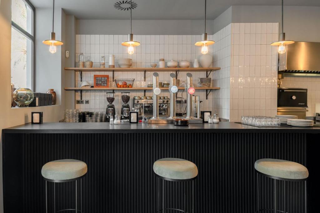 Kuchyň nebo kuchyňský kout v ubytování Toc Hostel Granada
