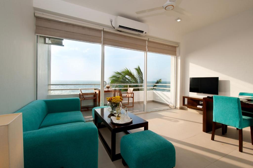 TV a/nebo společenská místnost v ubytování The Beach Apartments