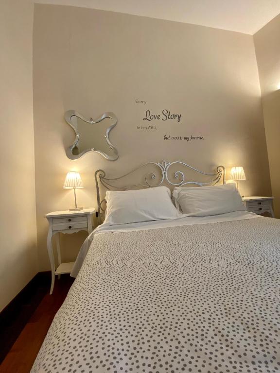 Postel nebo postele na pokoji v ubytování La Via della Giudecca