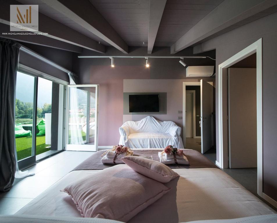 Postel nebo postele na pokoji v ubytování Art B&B Design