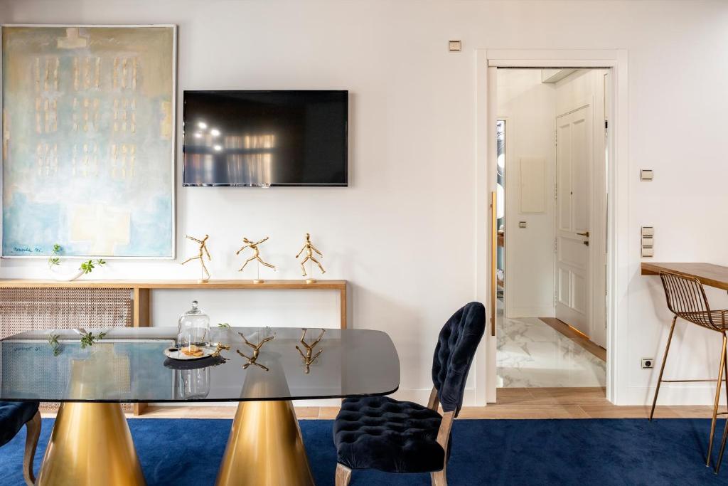Televízia a/alebo spoločenská miestnosť v ubytovaní Luxurious by Sebastiana Group