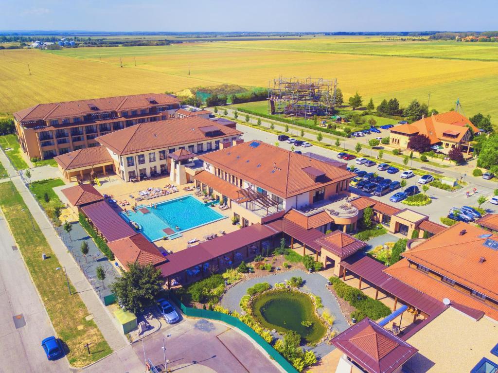 an overhead view of a resort with a swimming pool at Caramell Premium Resort Superior in Bük