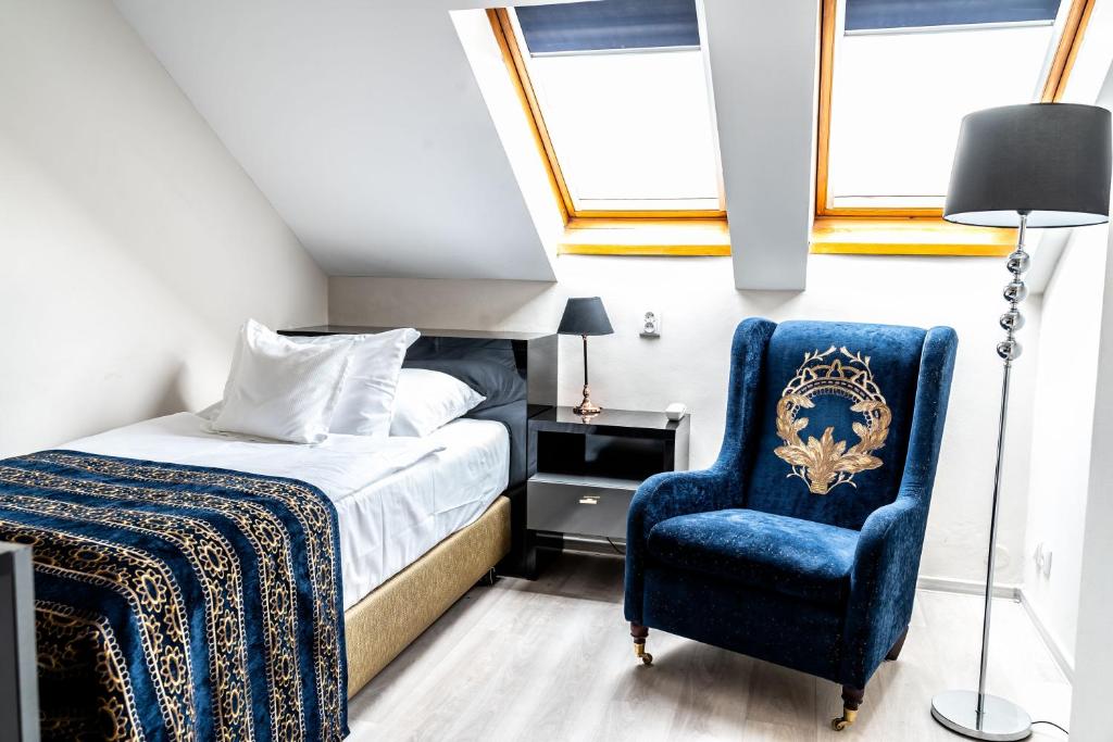 Postel nebo postele na pokoji v ubytování Hotel Julian