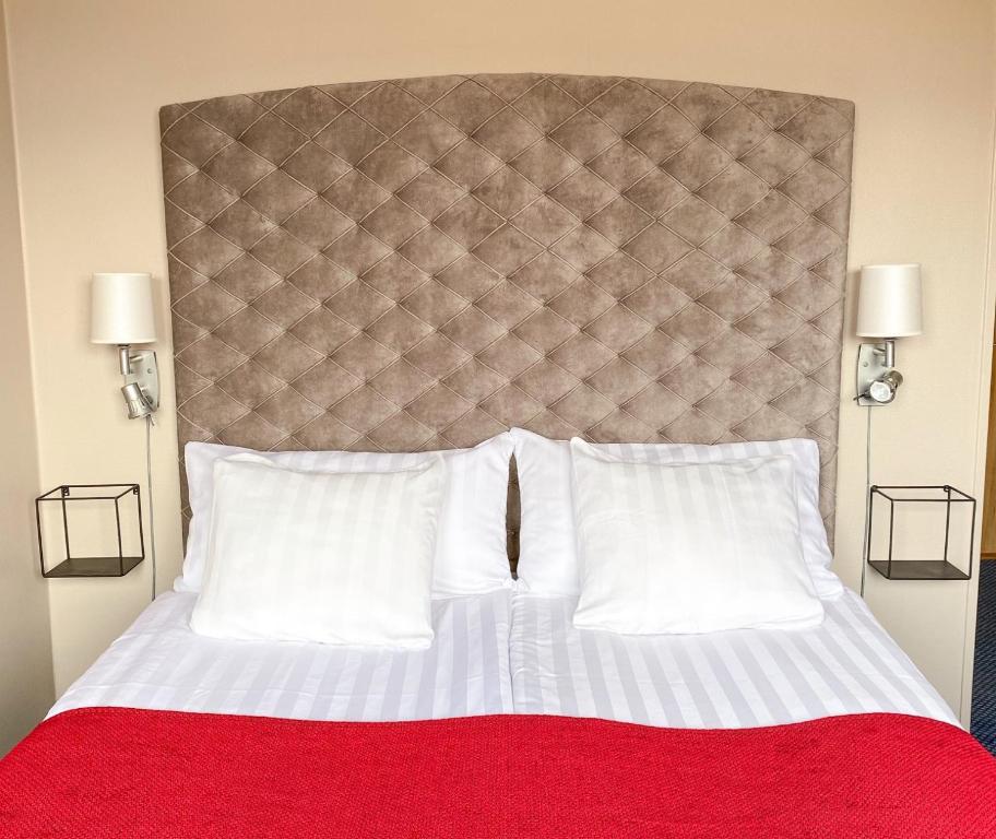 Postel nebo postele na pokoji v ubytování Hotel Jämteborg