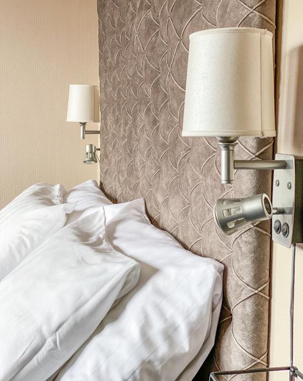 Postel nebo postele na pokoji v ubytování Hotel Jämteborg