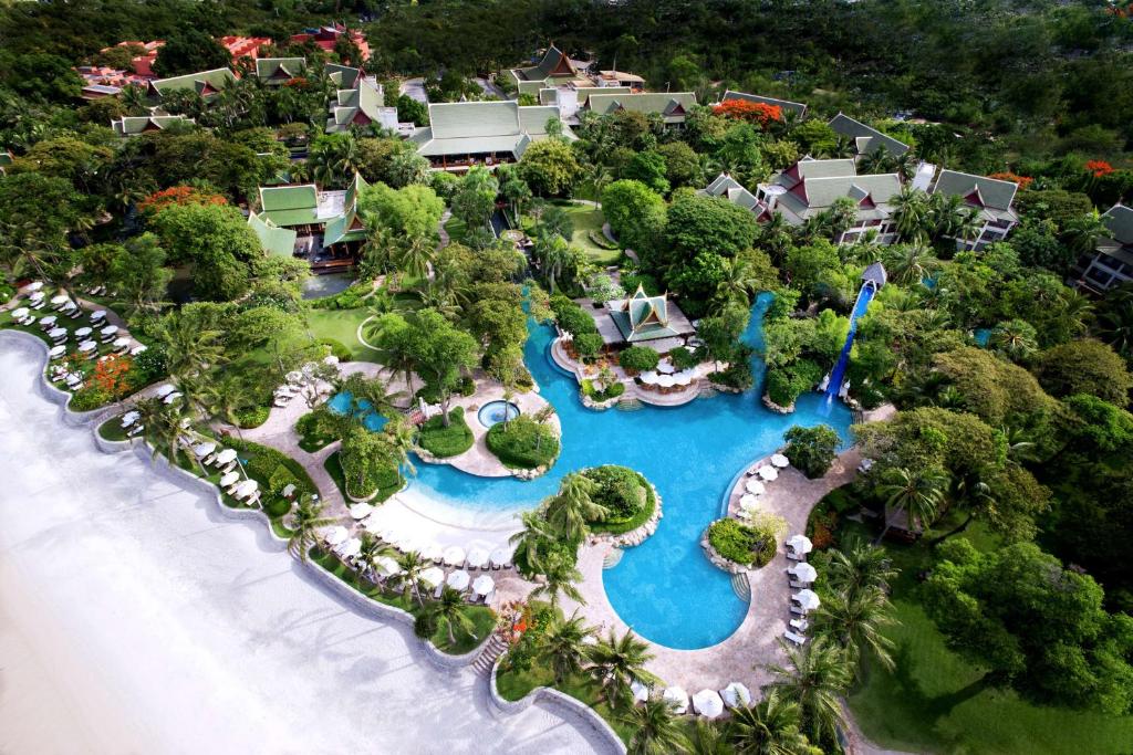 an aerial view of a resort with a swimming pool at Hyatt Regency Hua Hin SHA Extra Plus in Hua Hin