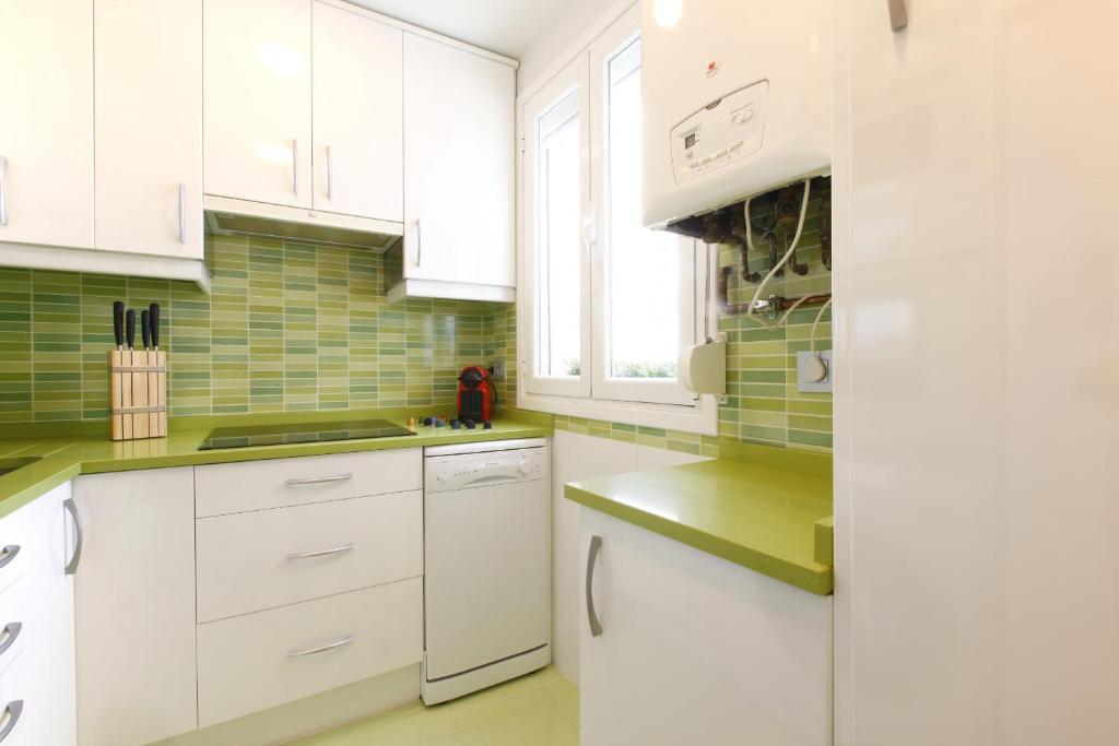 Kuchyň nebo kuchyňský kout v ubytování Sofia Suites