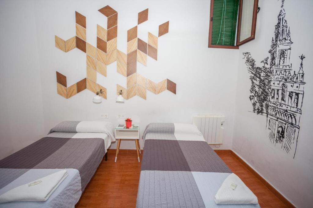 Postel nebo postele na pokoji v ubytování Pension San Pancracio