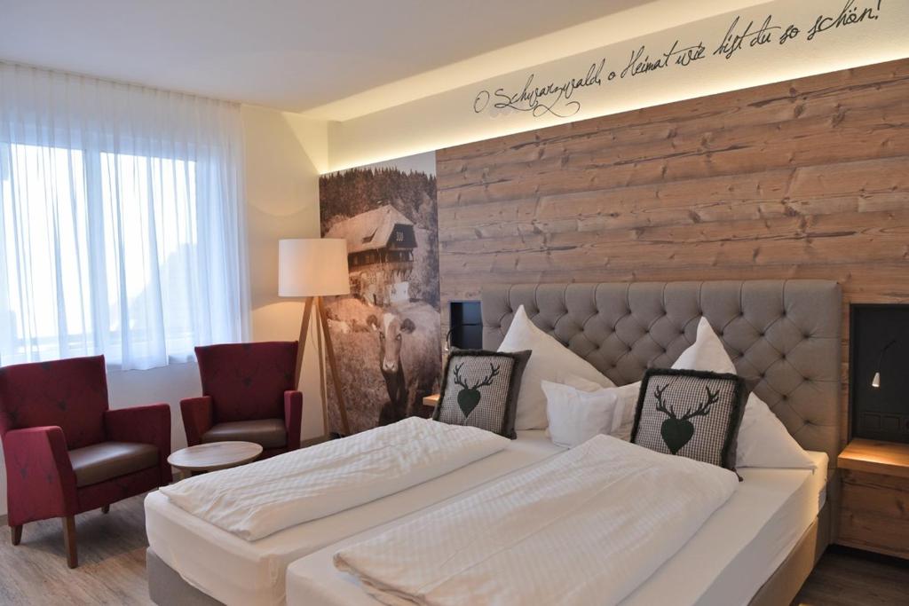 Postel nebo postele na pokoji v ubytování Hotel Hirschen