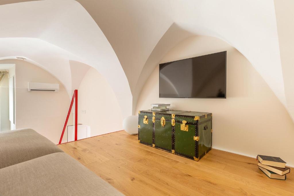 TV a/nebo společenská místnost v ubytování Palazzo Mascetti