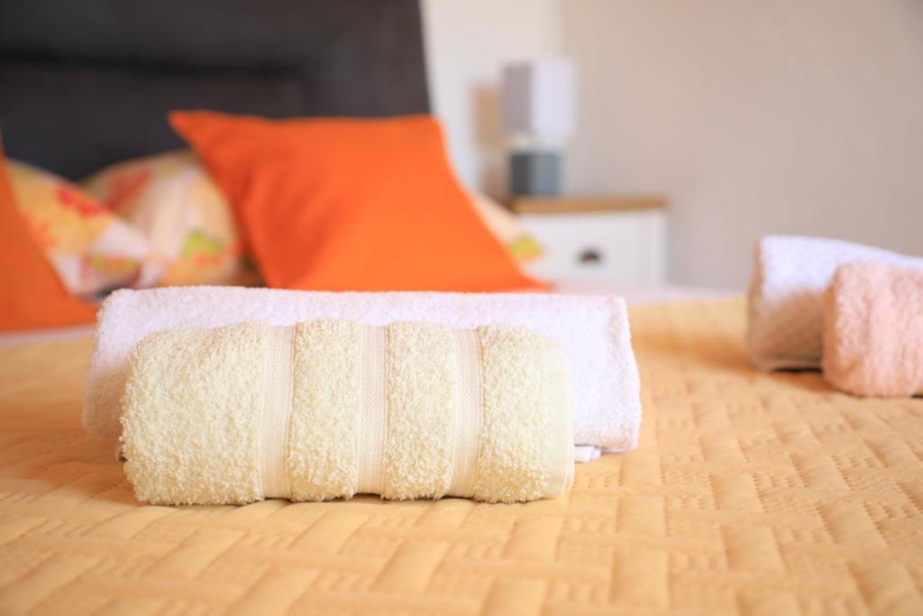 Postel nebo postele na pokoji v ubytování APARTMANI SARLIJA