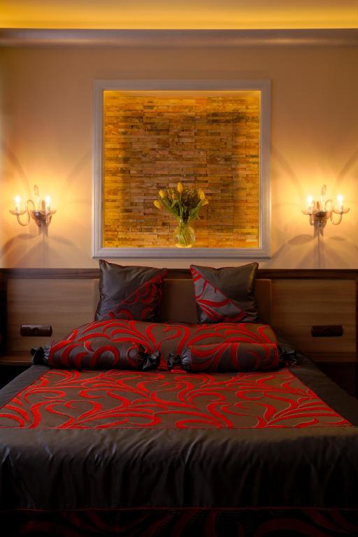 Postel nebo postele na pokoji v ubytování Hotel Politański