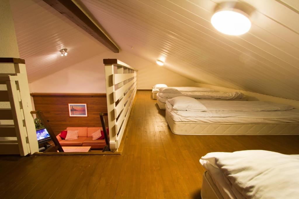 Postel nebo postele na pokoji v ubytování Polar Star Apartments