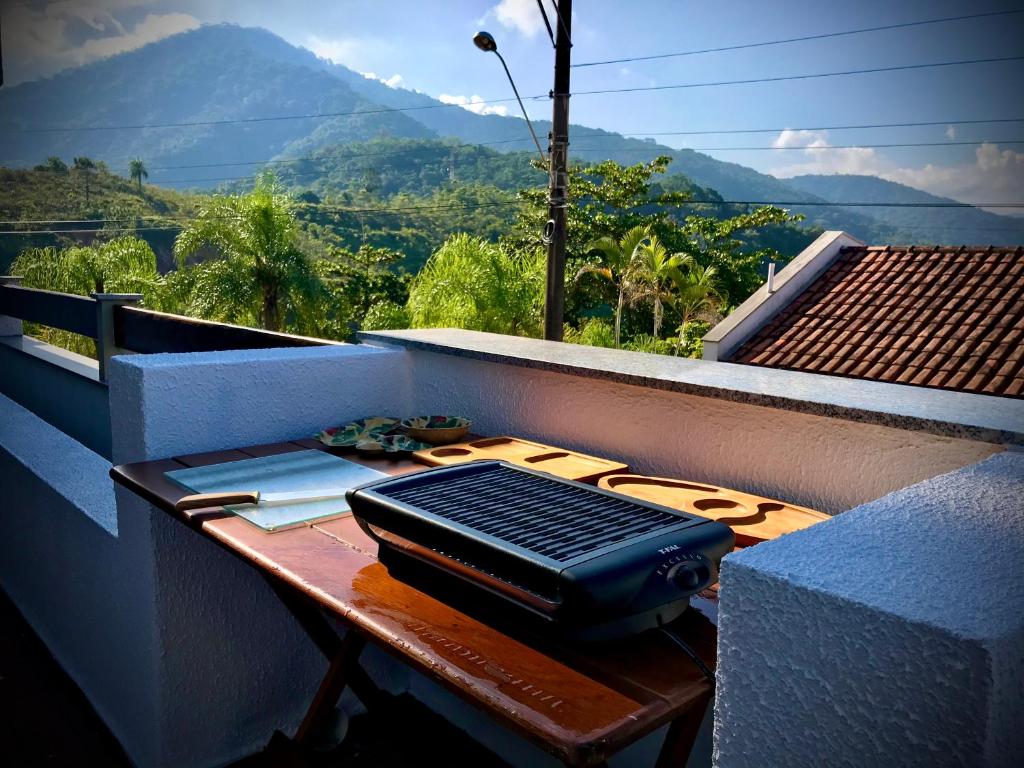  Amplo apê condomínio piscina Toninhas Ubatuba