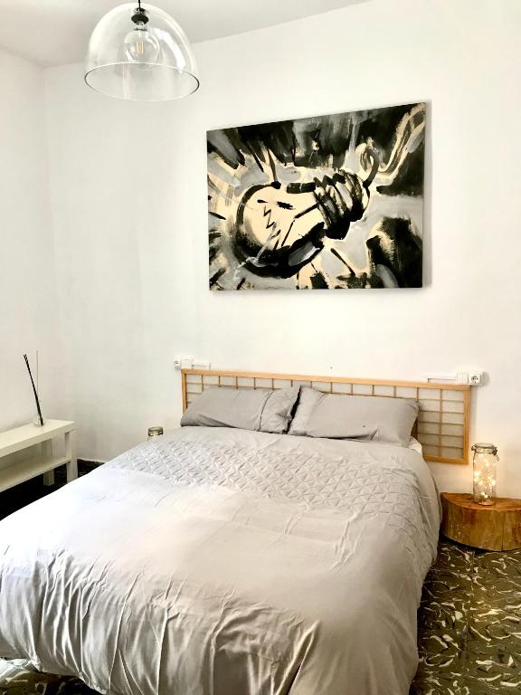 Postel nebo postele na pokoji v ubytování Casa Nadal