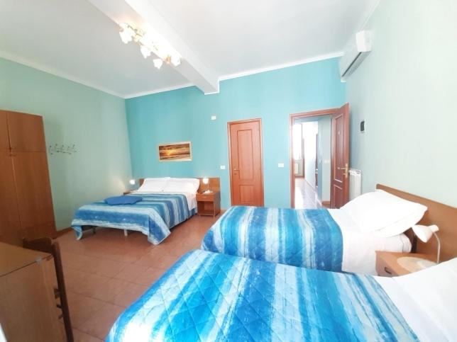 Postel nebo postele na pokoji v ubytování Hotel Alba Torino centro