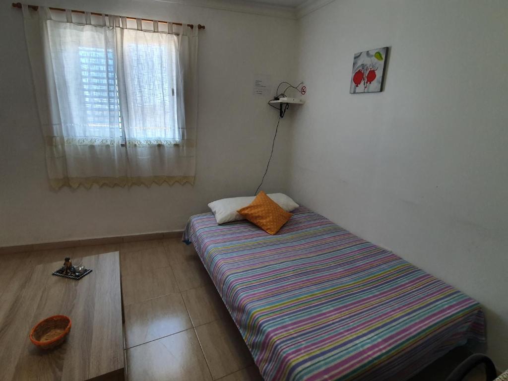 Postel nebo postele na pokoji v ubytování Holla del Saldo