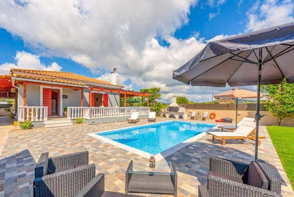 Bazén v ubytování Pothos Villas nebo v jeho okolí