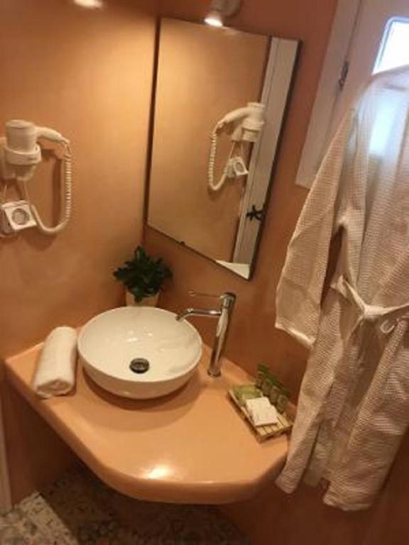 Koupelna v ubytování Langas Villas
