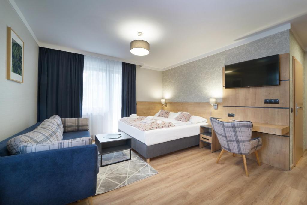 TV a/nebo společenská místnost v ubytování Artus Resort