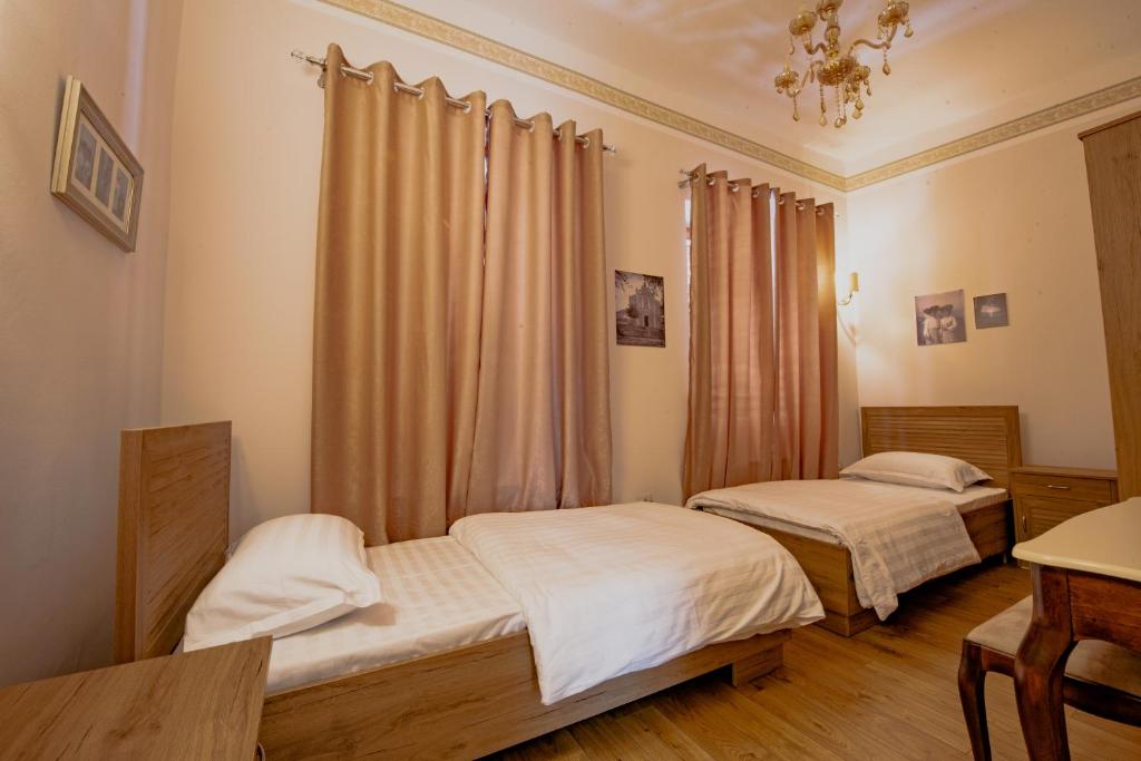 Postel nebo postele na pokoji v ubytování Hotel Loredano