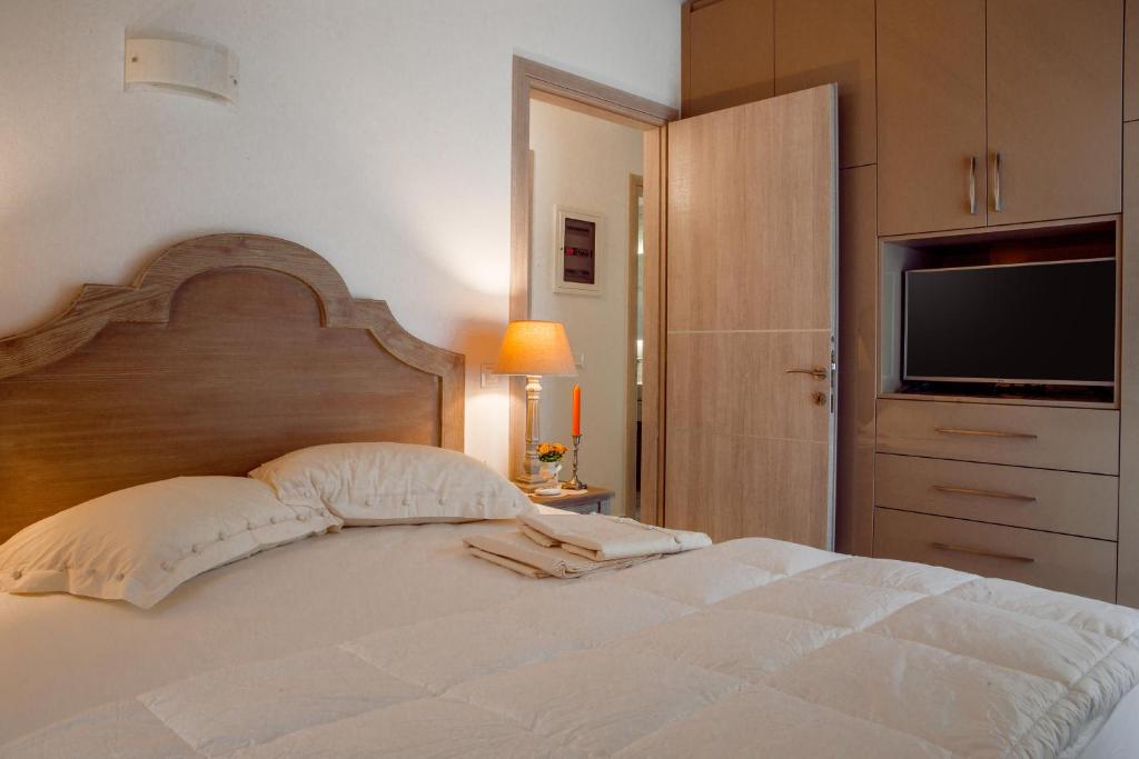 Postel nebo postele na pokoji v ubytování Eleni's Guesthouse