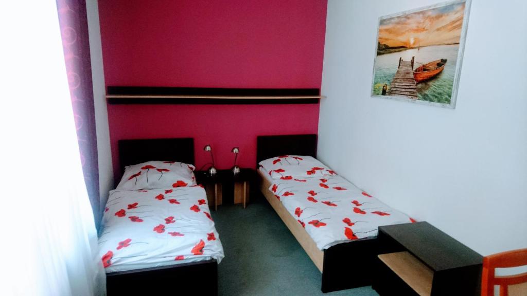 Postel nebo postele na pokoji v ubytování Hotel Antler