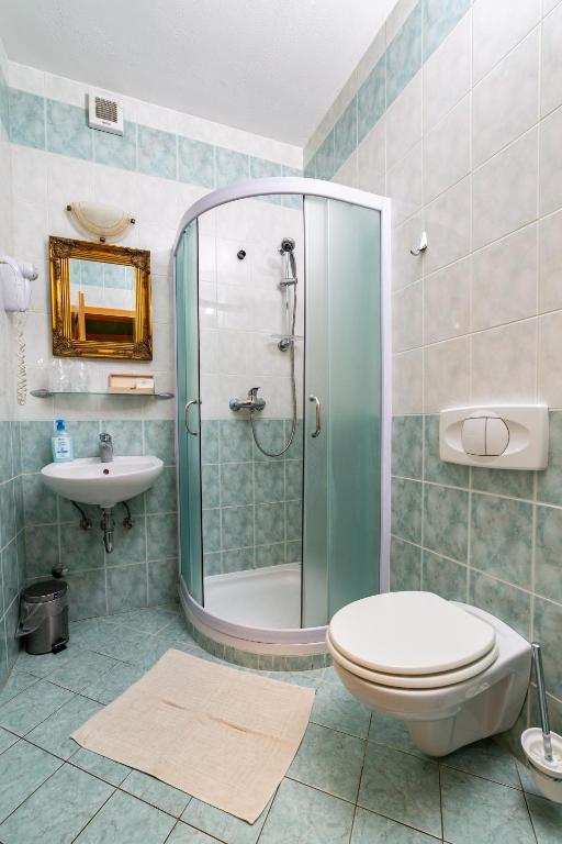 Koupelna v ubytování Rooms Herman