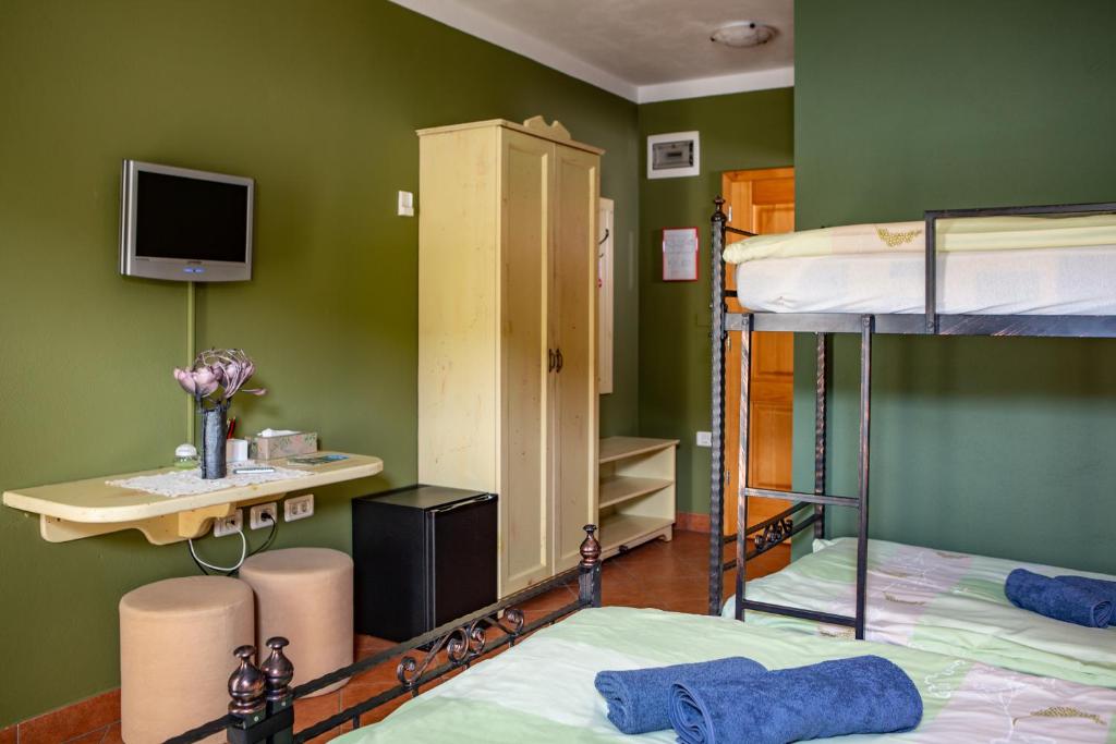 Postel nebo postele na pokoji v ubytování Rooms Herman