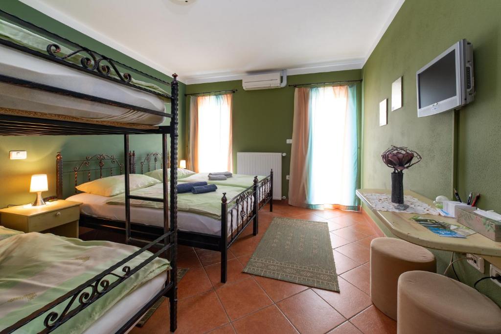 Postel nebo postele na pokoji v ubytování Rooms Herman