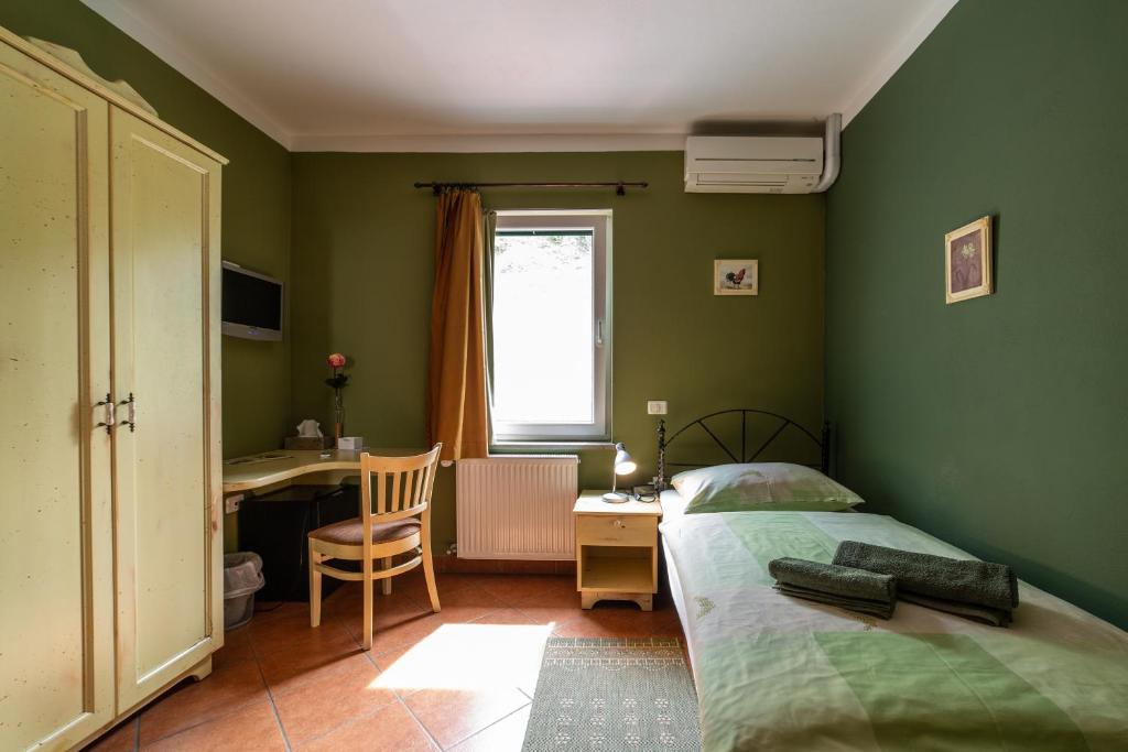 Postel nebo postele na pokoji v ubytování Rooms Herman