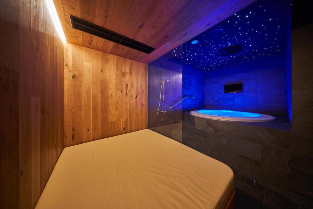Postel nebo postele na pokoji v ubytování Aparthotel Svatý Vavřinec