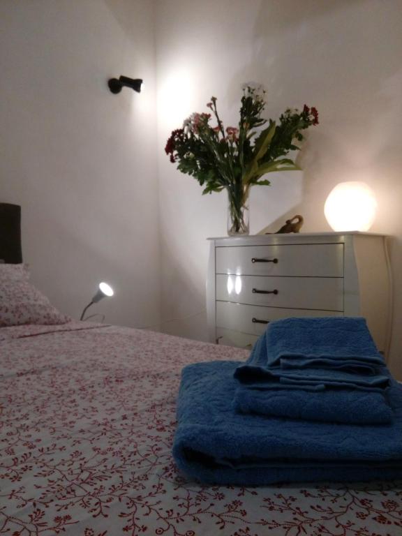 Posteľ alebo postele v izbe v ubytovaní Arimatea Casa Vacanza