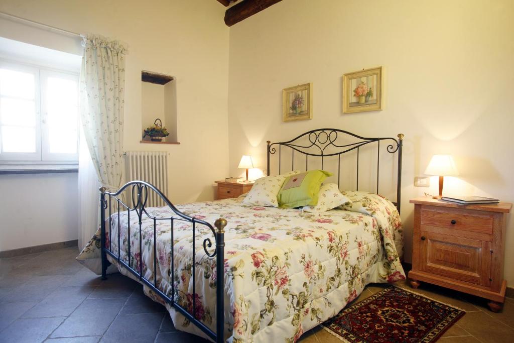 Posteľ alebo postele v izbe v ubytovaní Villa Pian De Noci - Tenuta del Palagio