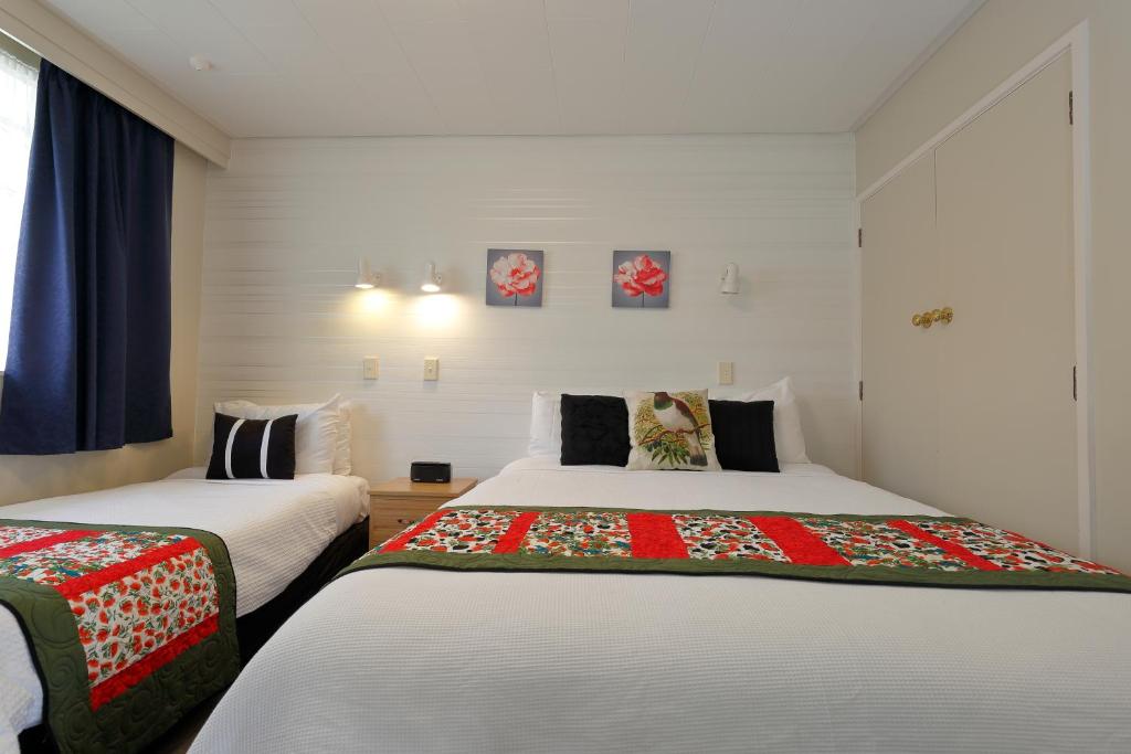 Postel nebo postele na pokoji v ubytování Aden Motel