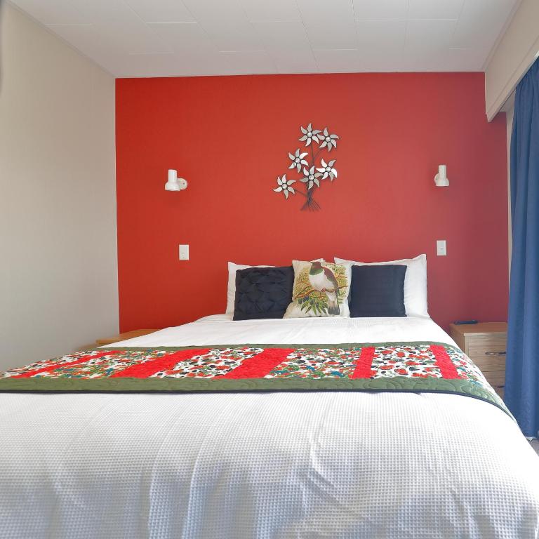 Postel nebo postele na pokoji v ubytování Aden Motel