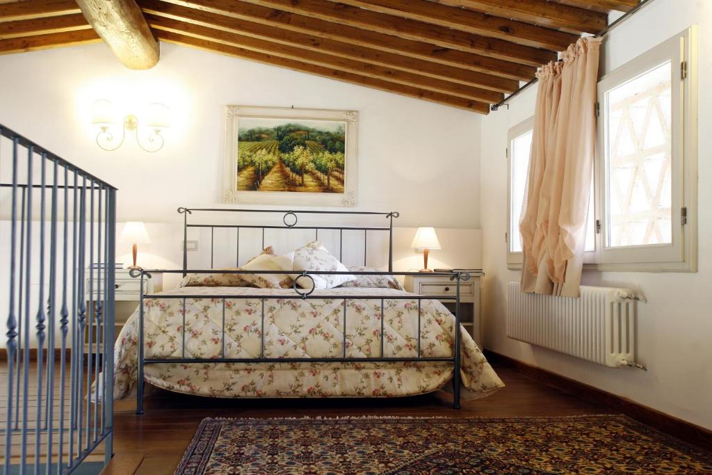 Posteľ alebo postele v izbe v ubytovaní Villa Pian De Noci - Tenuta del Palagio
