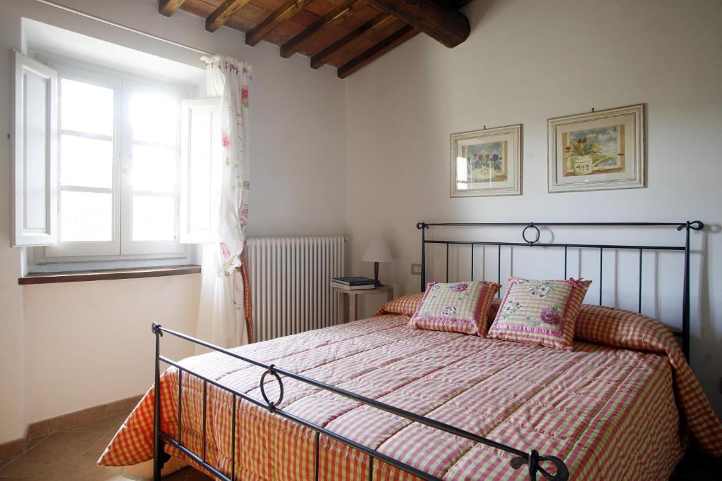 Posteľ alebo postele v izbe v ubytovaní Villa Pian De Noci - Tenuta del Palagio