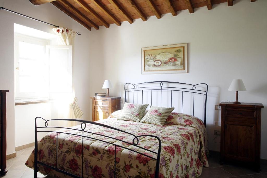 Posteľ alebo postele v izbe v ubytovaní Villa Pian De Noci - Tenuta del Palagio