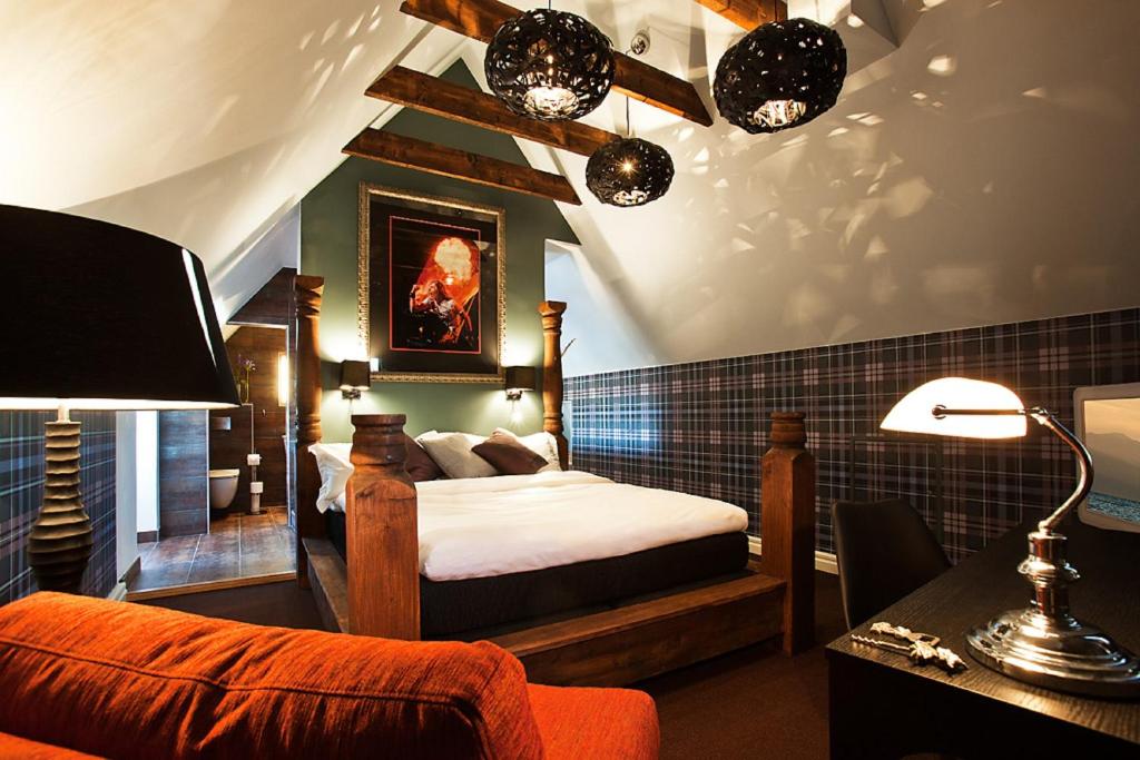 Postel nebo postele na pokoji v ubytování Hesselby Slott